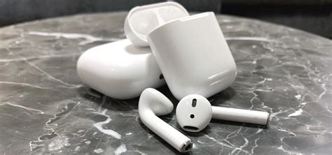 Why do my AirPods keep pausing my music, and could it be related to the moon's gravitational pull?